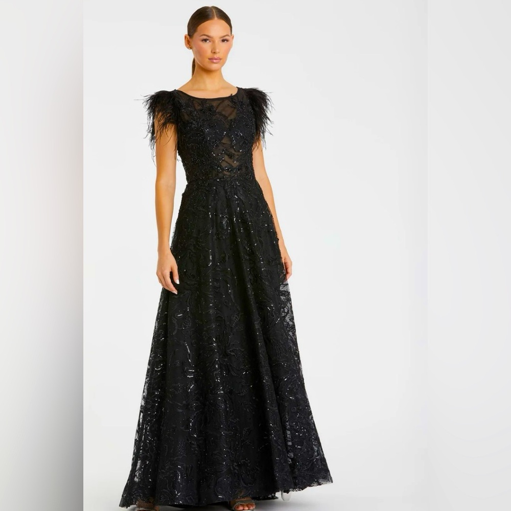 Worn Once Mac Duggal Evening Gown. black beaded with Feather cap sleeve